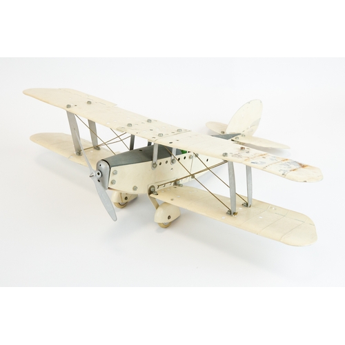 103 - 2 Meccano tinplate aeroplanes. Made up as a single engine Bi-Plane in cream and grey, complete with ... 