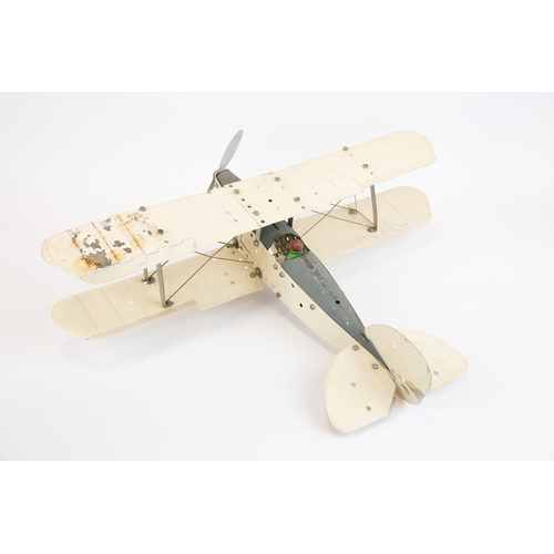 103 - 2 Meccano tinplate aeroplanes. Made up as a single engine Bi-Plane in cream and grey, complete with ... 