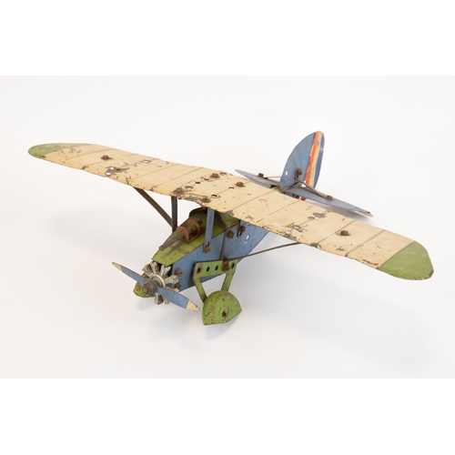 103 - 2 Meccano tinplate aeroplanes. Made up as a single engine Bi-Plane in cream and grey, complete with ... 