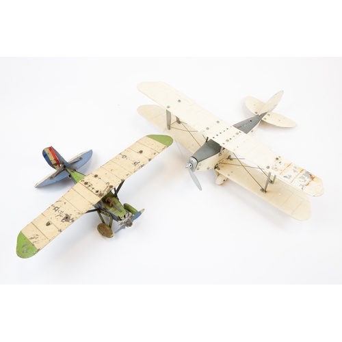 103 - 2 Meccano tinplate aeroplanes. Made up as a single engine Bi-Plane in cream and grey, complete with ... 