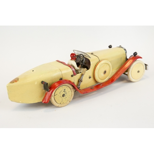 109 - A rare 1930's No.2 Meccano Constructor Car. A boat tail example in cream with red mudguards/running ... 