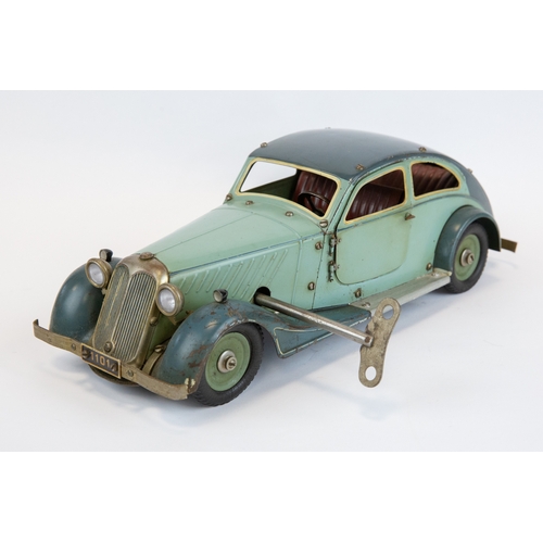 112 - A rare original 1930's Marklin clockwork Adler Streamlined limousine (1101c). In two tone green, wit... 