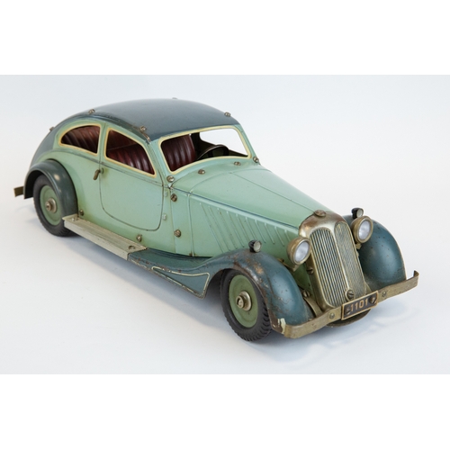 112 - A rare original 1930's Marklin clockwork Adler Streamlined limousine (1101c). In two tone green, wit... 