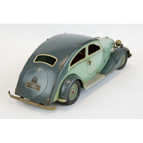 112 - A rare original 1930's Marklin clockwork Adler Streamlined limousine (1101c). In two tone green, wit... 