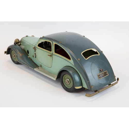 112 - A rare original 1930's Marklin clockwork Adler Streamlined limousine (1101c). In two tone green, wit... 