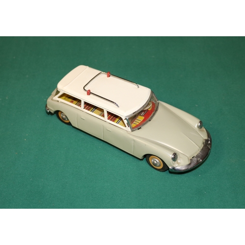 154 - A scarce early 1960's SFTF tinplate 1:24 scale friction powered model of a Citroen ID19 DS Safari. I... 