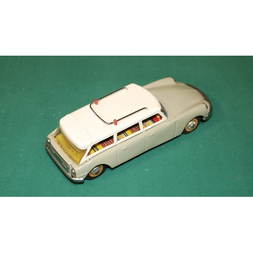 154 - A scarce early 1960's SFTF tinplate 1:24 scale friction powered model of a Citroen ID19 DS Safari. I... 