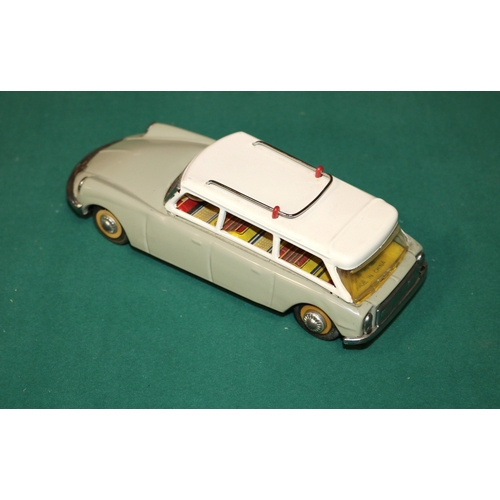 154 - A scarce early 1960's SFTF tinplate 1:24 scale friction powered model of a Citroen ID19 DS Safari. I... 