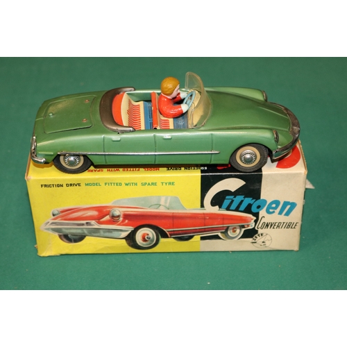 155 - A scarce early 1960's SFTF tinplate 1:24 scale friction powered model of a Citroen ID19 DS 4-door Co... 