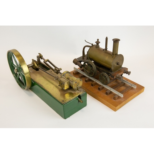 191 - A horizontal single cylinder steam engine. Of mostly brass construction, fitted with a 13.5cm flywhe... 