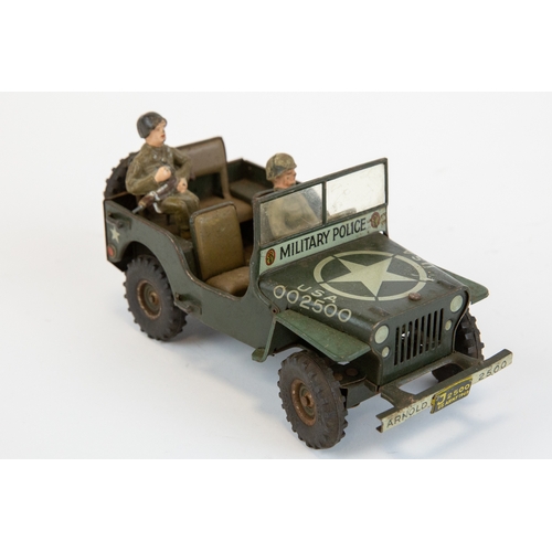 201 - A scarce Arnold made in Germany model of a Willys jeep. Military police issue, body work finished in... 