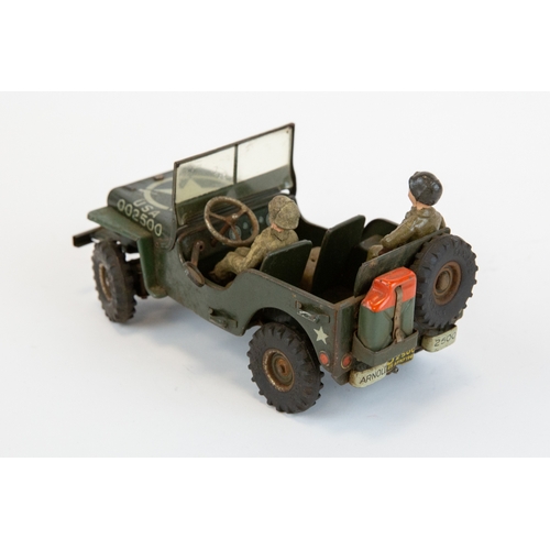 201 - A scarce Arnold made in Germany model of a Willys jeep. Military police issue, body work finished in... 