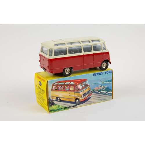 270 - French Dinky Toys Mercedes-Benz 'Petit Autocar' (minibus). An example in dark red and ivory livery, ... 