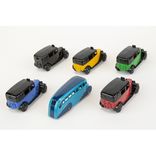 301 - 6 well restored Dinky Toys TAXI's (36g). Colour variations blue, light green, black, red and yellow.... 