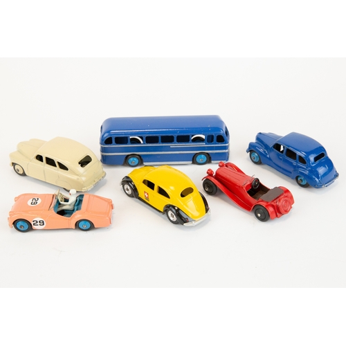 305 - 6 Dinky Toys. Duple Roadmaster Coach in dark blue, Standard Vanguard in cream, Austin Devon in dark ... 