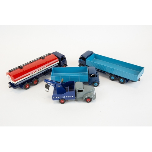 311 - 4 well restored early Dinky Toys. A Foden FG REGENT Petrol Tanker. A Foden DG Wagon, Guy 4-Ton Wagon... 