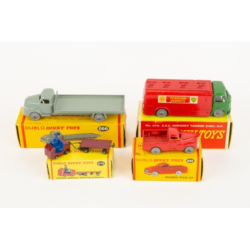 314 - 4 Dublo Dinky Toys. Morris Pickup (065). In red with grey wheels. Bedford Flat Truck (066), in grey ... 