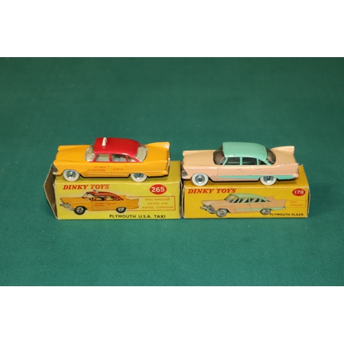 321 - 2 Dinky Toys Plymouth Plaza. A U.S.A. TAXI (265) in orange and red with cream interior, TAXI to roof... 