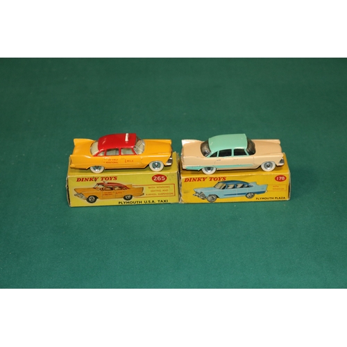 321 - 2 Dinky Toys Plymouth Plaza. A U.S.A. TAXI (265) in orange and red with cream interior, TAXI to roof... 