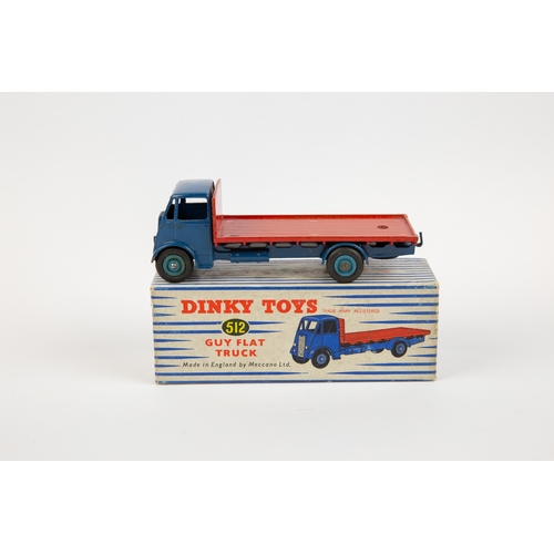 322 - 2 Dinky Toys. A Supertoys Leyland Comet Lorry (531). Example with yellow cab and chassis, pale green... 