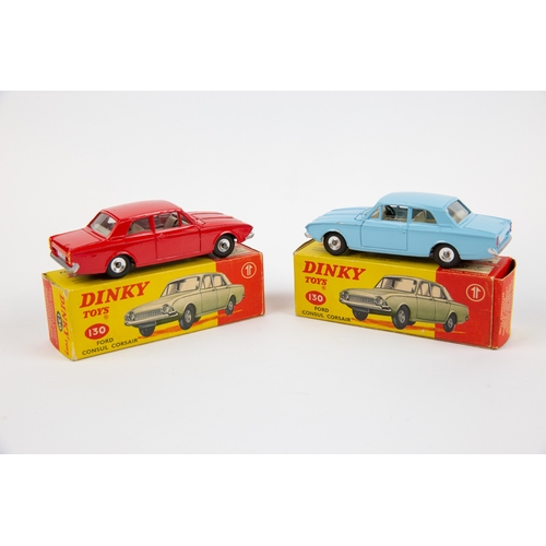 324 - 2 Dinky Toys Ford Corsair (130). One example in light blue with cream interior. Plus another in brig... 