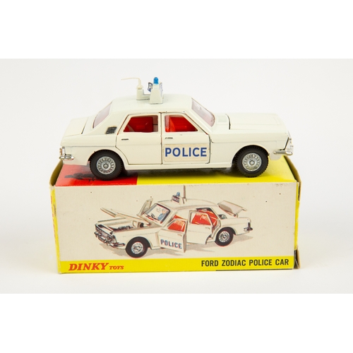 325 - 2 Dinky Toys POLICE Cars. Ford Zodiac (255) in white with red interior and dark metallic grey base, ... 