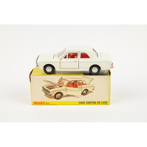 327 - 2 Dinky Toys. Ford Cortina (159). In white with red interior, with smooth spun wheels. Plus a Ford C... 