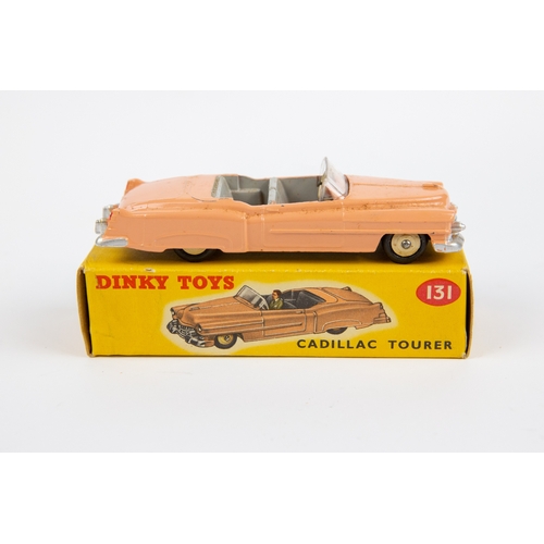 333 - 2 Dinky Toys. Cadillac Tourer (Eldorado) (131). An example in pink with light grey interior and crea... 