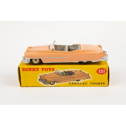 333 - 2 Dinky Toys. Cadillac Tourer (Eldorado) (131). An example in pink with light grey interior and crea... 