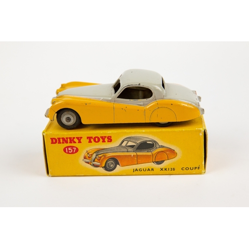 335 - 2 Dinky Toys. Austin Atlantic Convertible (106). An example in  black with silver trim, red interior... 