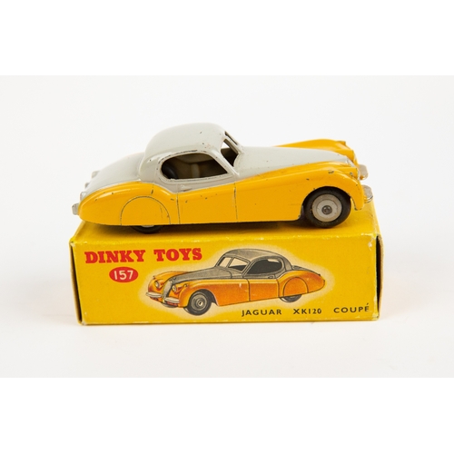 335 - 2 Dinky Toys. Austin Atlantic Convertible (106). An example in  black with silver trim, red interior... 