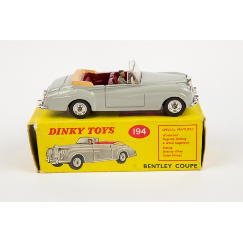 336 - 2 Dinky Toys. Triumph 2000 (135). In metallic light green with cream roof and red interior, small sp... 