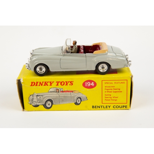 336 - 2 Dinky Toys. Triumph 2000 (135). In metallic light green with cream roof and red interior, small sp... 