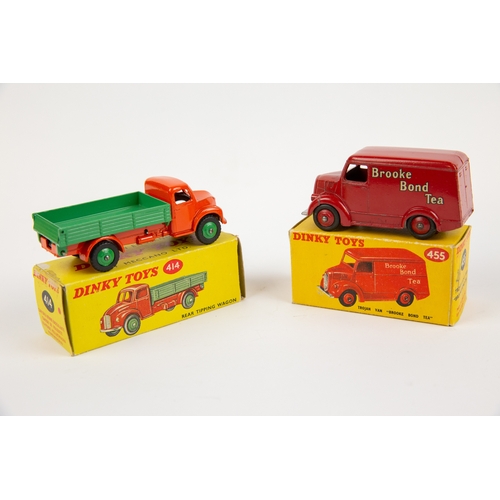 338 - 2 Dinky Toys. Dodge Rear Tipping Wagon (414). An example with orange cab and chassis, with mid green... 