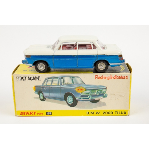 343 - 2 Dinky Toys. B.M.W. 2000TiLux (157). In metallic blue and white with red interior, with battery pow... 