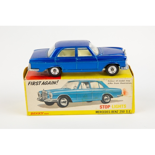 343 - 2 Dinky Toys. B.M.W. 2000TiLux (157). In metallic blue and white with red interior, with battery pow... 