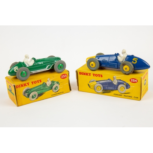 345 - 2 Dinky Toys single seat racing cars. Cooper-Bristol Racing car (233). In dark green, with mid green... 