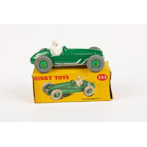 345 - 2 Dinky Toys single seat racing cars. Cooper-Bristol Racing car (233). In dark green, with mid green... 