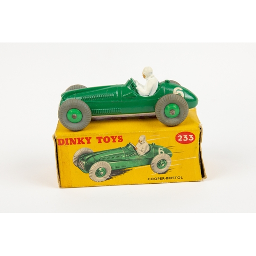 345 - 2 Dinky Toys single seat racing cars. Cooper-Bristol Racing car (233). In dark green, with mid green... 