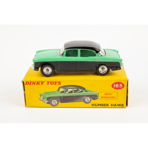 349 - 2 Dinky Toys. Humber Hawk (165). An example in light green and black with black roof and spun wheels... 