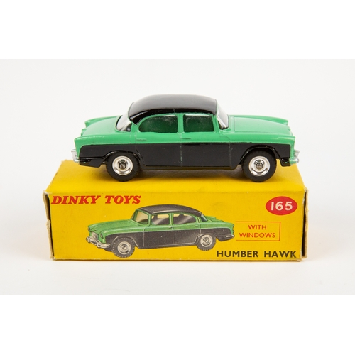 349 - 2 Dinky Toys. Humber Hawk (165). An example in light green and black with black roof and spun wheels... 