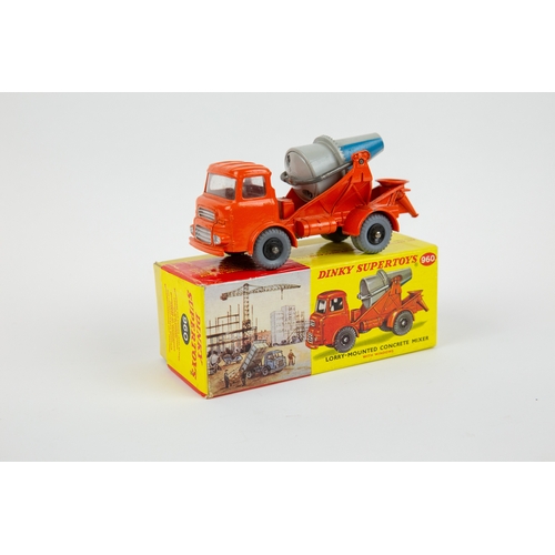 354 - A Dinky Toys Lorry Mounted Cement Mixer (960). An Albion in orange with grey and blue rotating mixer... 