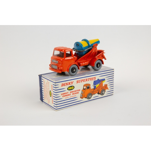 355 - A Dinky Toys Lorry Mounted Cement Mixer (960). An Albion in orange with blue and yellow rotating mix... 