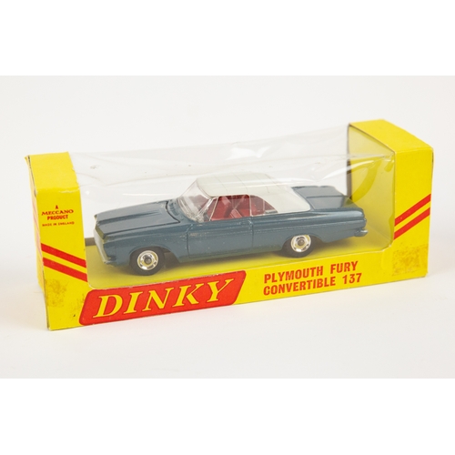 359 - A rare American export Dinky Toys Plymouth Fury Sports (115). In off white with red interior, comple... 