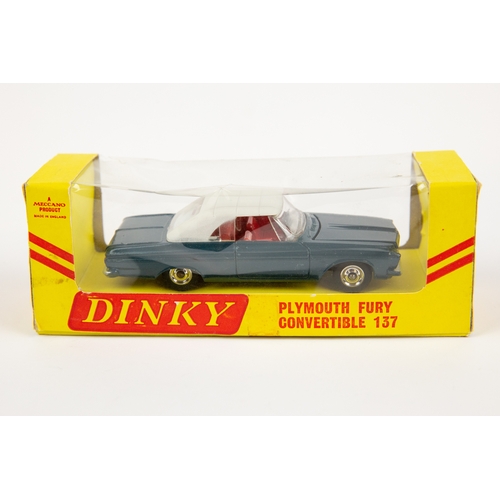 359 - A rare American export Dinky Toys Plymouth Fury Sports (115). In off white with red interior, comple... 