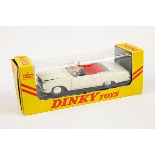 360 - A rare American export Dinky Toys Plymouth Fury Convertible (137). In dark blue with red interior an... 