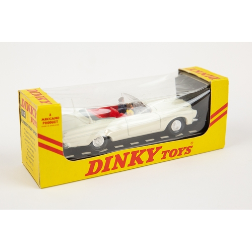 360 - A rare American export Dinky Toys Plymouth Fury Convertible (137). In dark blue with red interior an... 