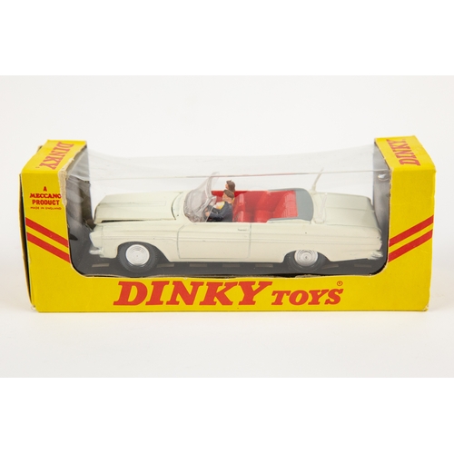 360 - A rare American export Dinky Toys Plymouth Fury Convertible (137). In dark blue with red interior an... 