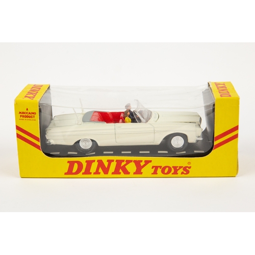 360 - A rare American export Dinky Toys Plymouth Fury Convertible (137). In dark blue with red interior an... 