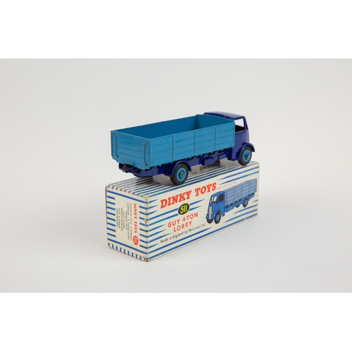 375 - Dinky Toys Guy 4-Ton Lorry (511). Cab and chassis in violet blue with mid blue body and wheels. Boxe... 